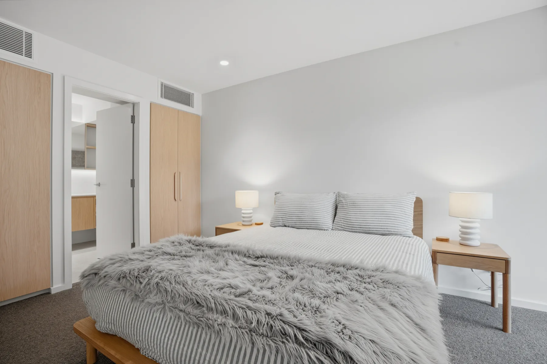 The main bedroom, with built-in robes and its own ensuite